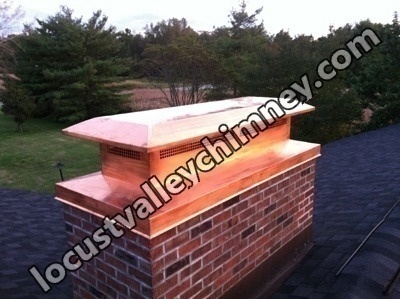 Before and after chimney cap replacement in Locust Valley, NY