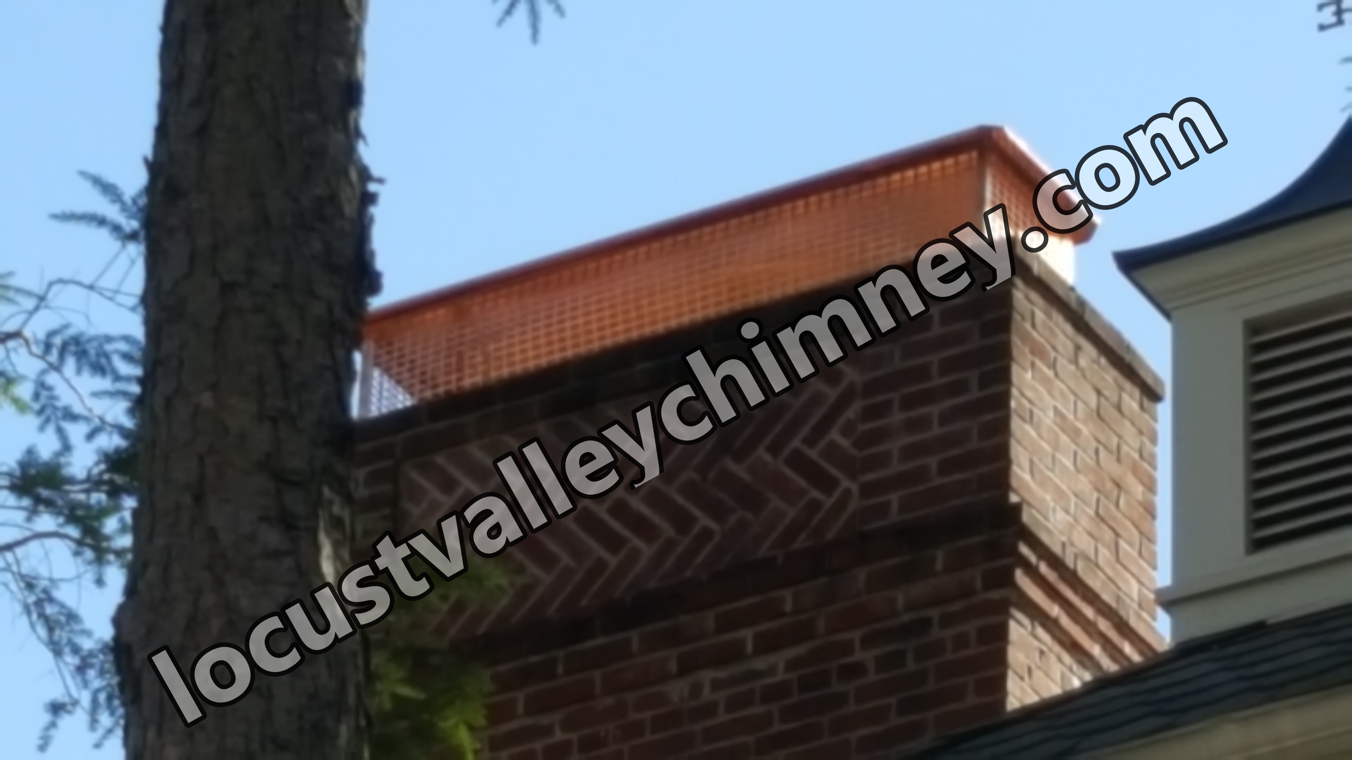 New stainless steel chimney cap installed in Locust Valley, NY