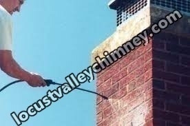 Carbon monoxide safety inspection on gas chimney in Mill Neck, New York